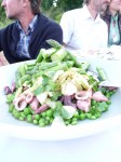 Squick with black butter, garlic, peas, asparagus, green strawberries