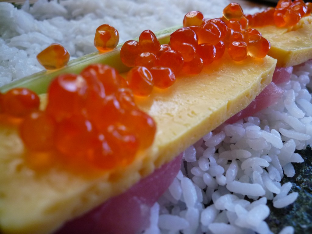 Ikura squishy salmon roe like dabby dots of jelly. Salty on my lips and yummy in my belly