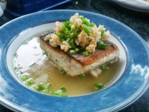 White Seabass in ginger broth with crispy rice